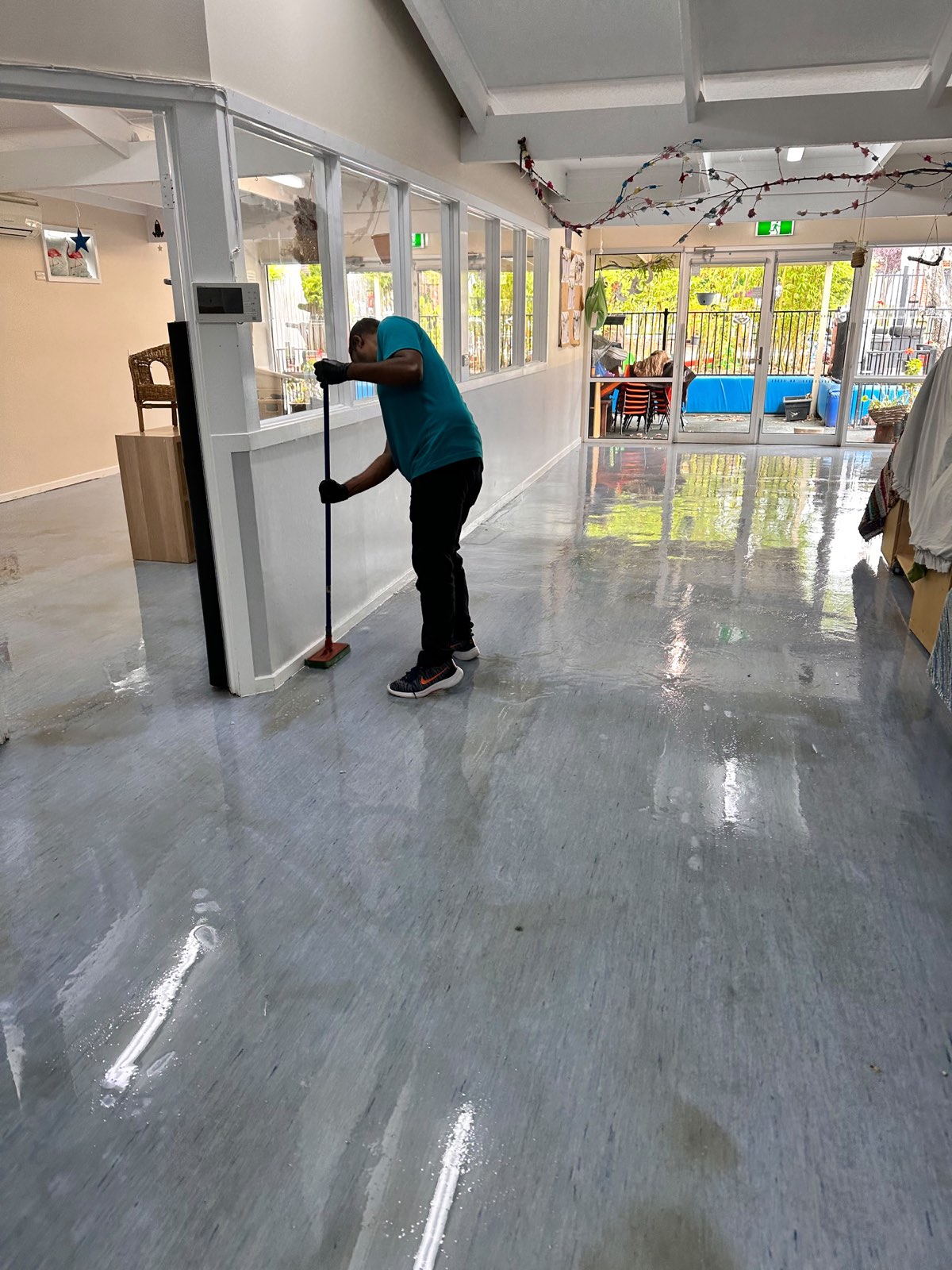 Early learning centre hard floor, dull and worn before strip and seal